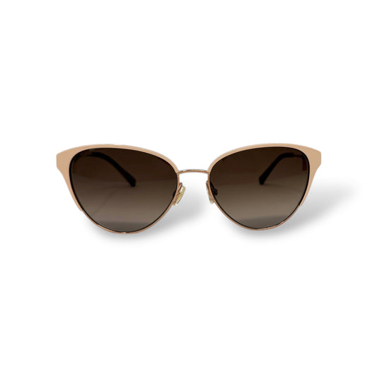 Kate Spade - Ianna Sunglasses gold frame with brown tortoise shell arm tips and cream color frame design. front view