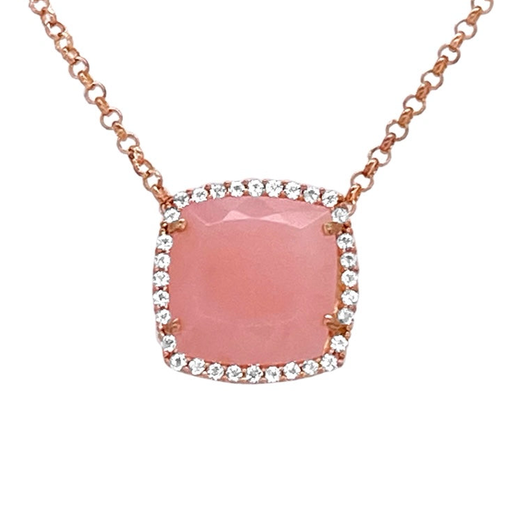 Necklace with a pink stone and rose gold chain on a white background
18K Rose Gold Vermeil over 925 Silver - 3.7 grs
Cushion cut Rose Chalcedony - 12mm cushion gemstone w/ 5.6 cts
32 White Topaz round 1.0 mm diamond cut