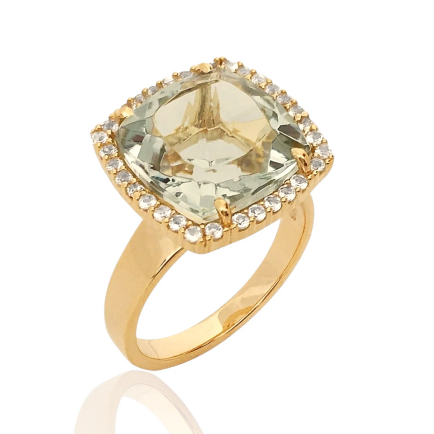 Gold ring with a large green gemstone and smaller diamonds on a white background
18K Yellow Gold Vermeil over 925 Silver - 3.7 grs
Cushion cut Prasiolite - 12mm cushion gemstone w/ 5.6 cts
32 White Topaz round 1.0 mm diamond cut