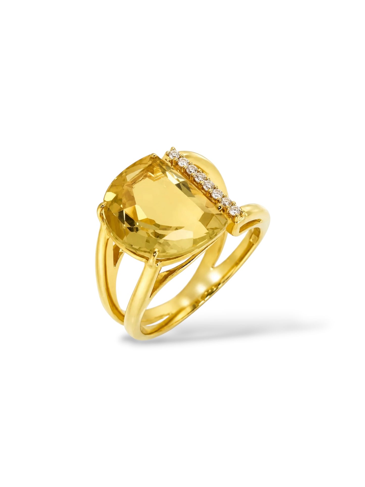 A yellow gold ring featuring a large cushion-cut yellow gemstone and a curved row of small clear stones along the top, set against a plain white background.