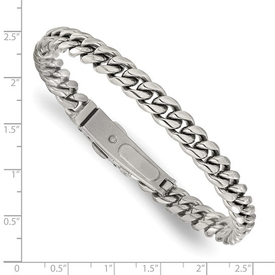 Silver chain bracelet with a measurement scale on a white background
Material: stainless steel flat links
Color: silver
Closure: deployment buckle
Measurement: 8" circumference. 8 mm width