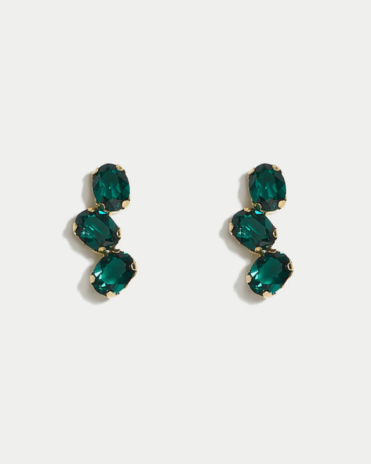 Pair of green swarovski crystals earrings on a white background