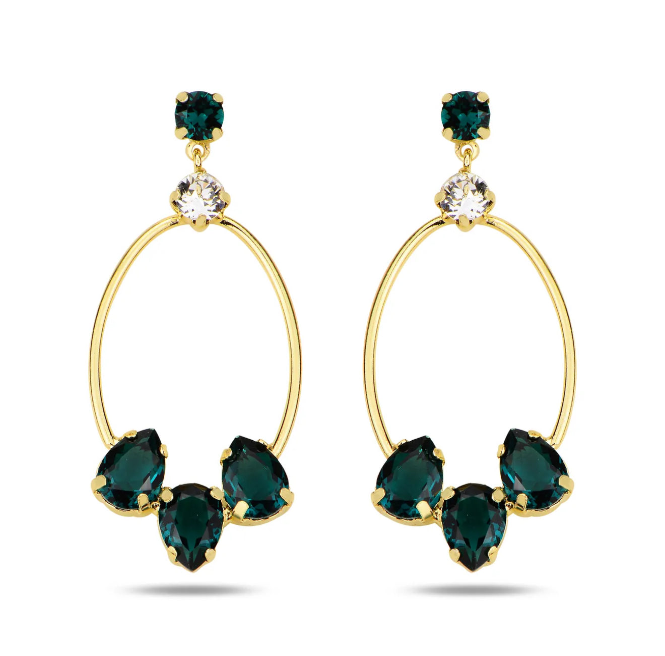 Gold hoop earrings with green Swarovski Crystals on a white background