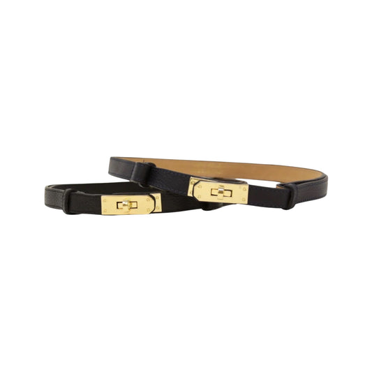 Two black belts with gold buckles on a white background