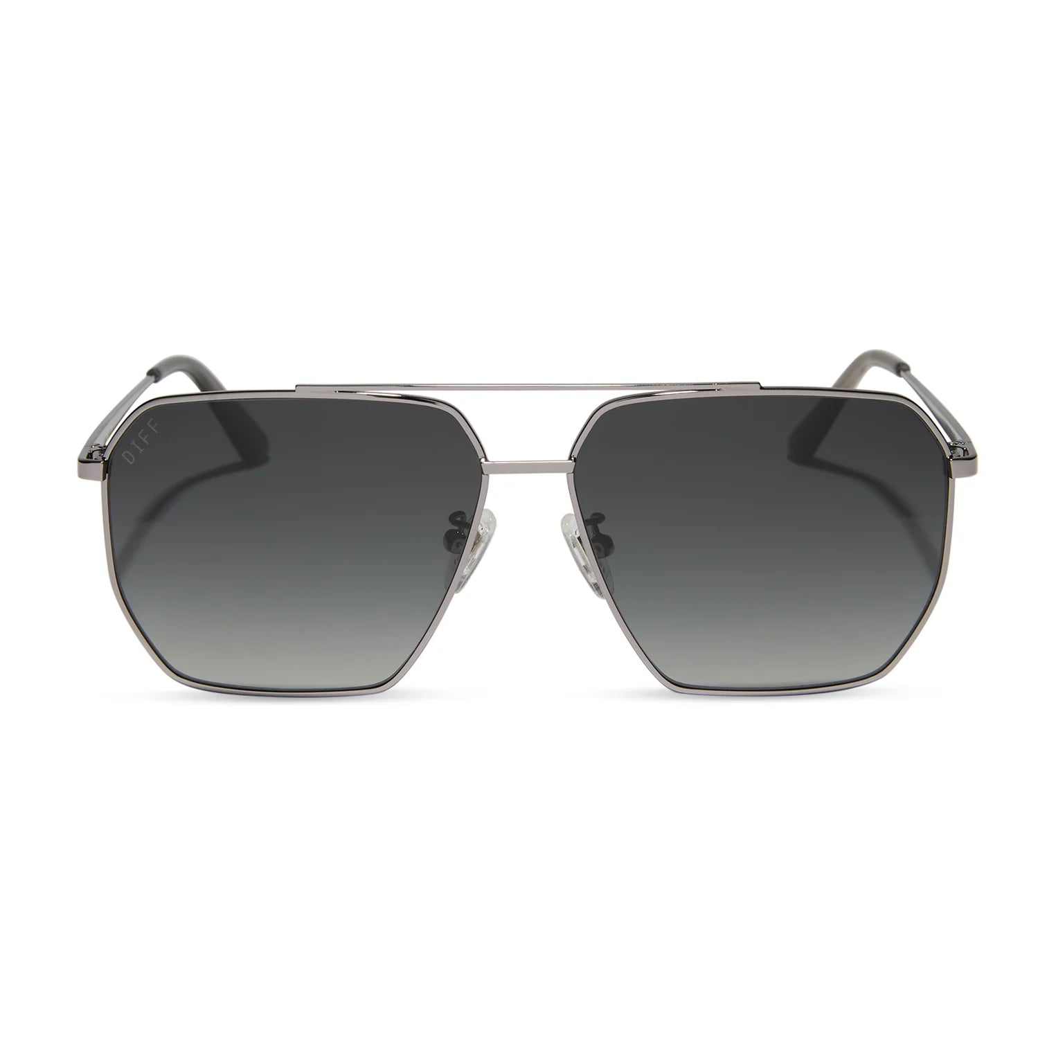 Sunglasses with a metallic frame and dark gradient lenses on a white background
