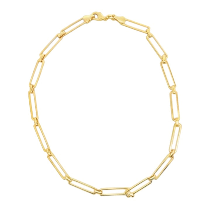Gold chain necklace on a white background