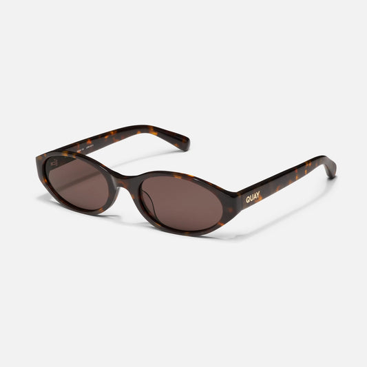 Sunglasses with tortoiseshell frame and brown lenses on a white background