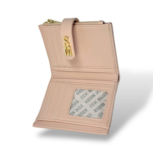 Steve Madden women's light pink wallet with removable card holder. Picture showing inside view of the wallet. You can see the ID window slot, 6 card slots, 2 bill compartments and the snap strap with gold toned logo