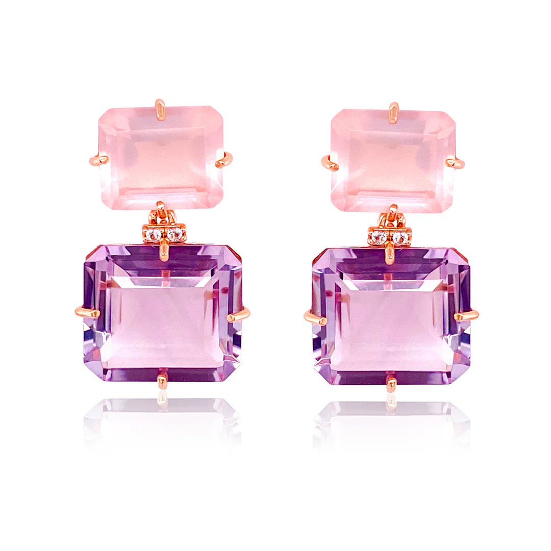 Pair of earrings with pink and purple square stones on a white background
18K Yellow Gold Vermeil over 925 Silver - 3.5 grs
Emerald cut Pink Amethyst, Rose Quartz - 33.7 cts
4 White Topaz round 1.0 mm diamond cut