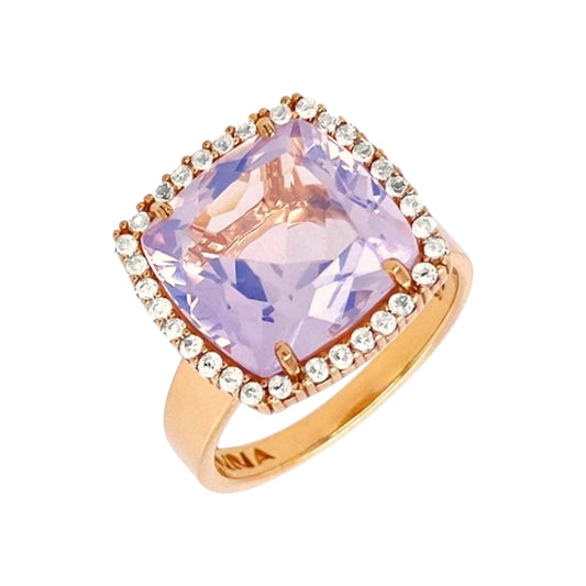 yellow gold ring with a large purple gemstone and smaller diamonds on a white background
18K Yellow Gold Vermeil over 925 Silver - 3.7 grs
Cushion cut Lilac Opal Amethyst - 12mm cushion gemstone w/ 5.6 cts
32 White Topaz round 1.0 mm diamond cut