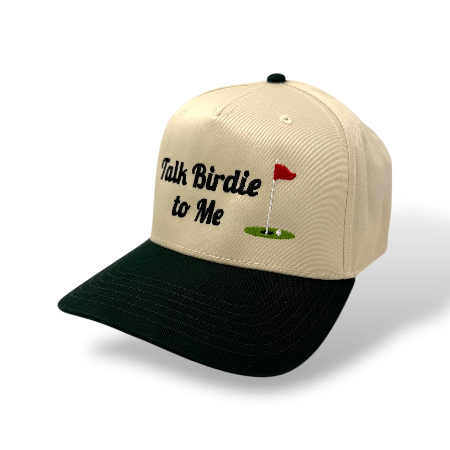 Beige and black cap with 'Talk Birdie to Me' text and golf flag design on a white background
Color: tan and dark green two-toned hat
Style: 5 panel structured fabric trucker hat
Closure: snapback adjustable sizing
Material: 65% polyester, 35% cotton