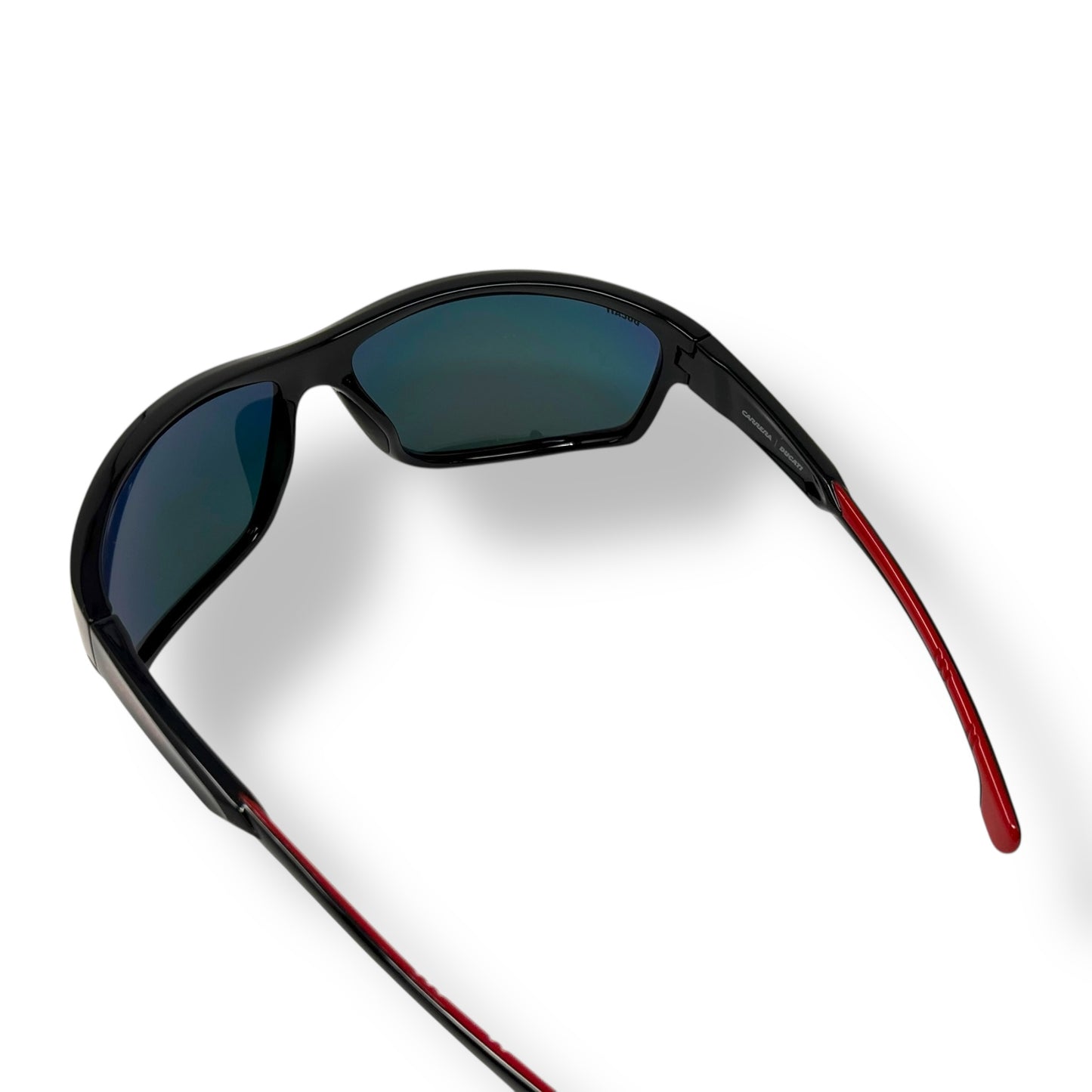Sunglasses with black frame and red arm on a white background
Carrera - CARDUC 002/S 0OIT UZ
Frame style: wrap around, lightweight
Frame Color: sleek black with red detailing
Lens Color: black
lens technology: 100% UVA/B sun protection