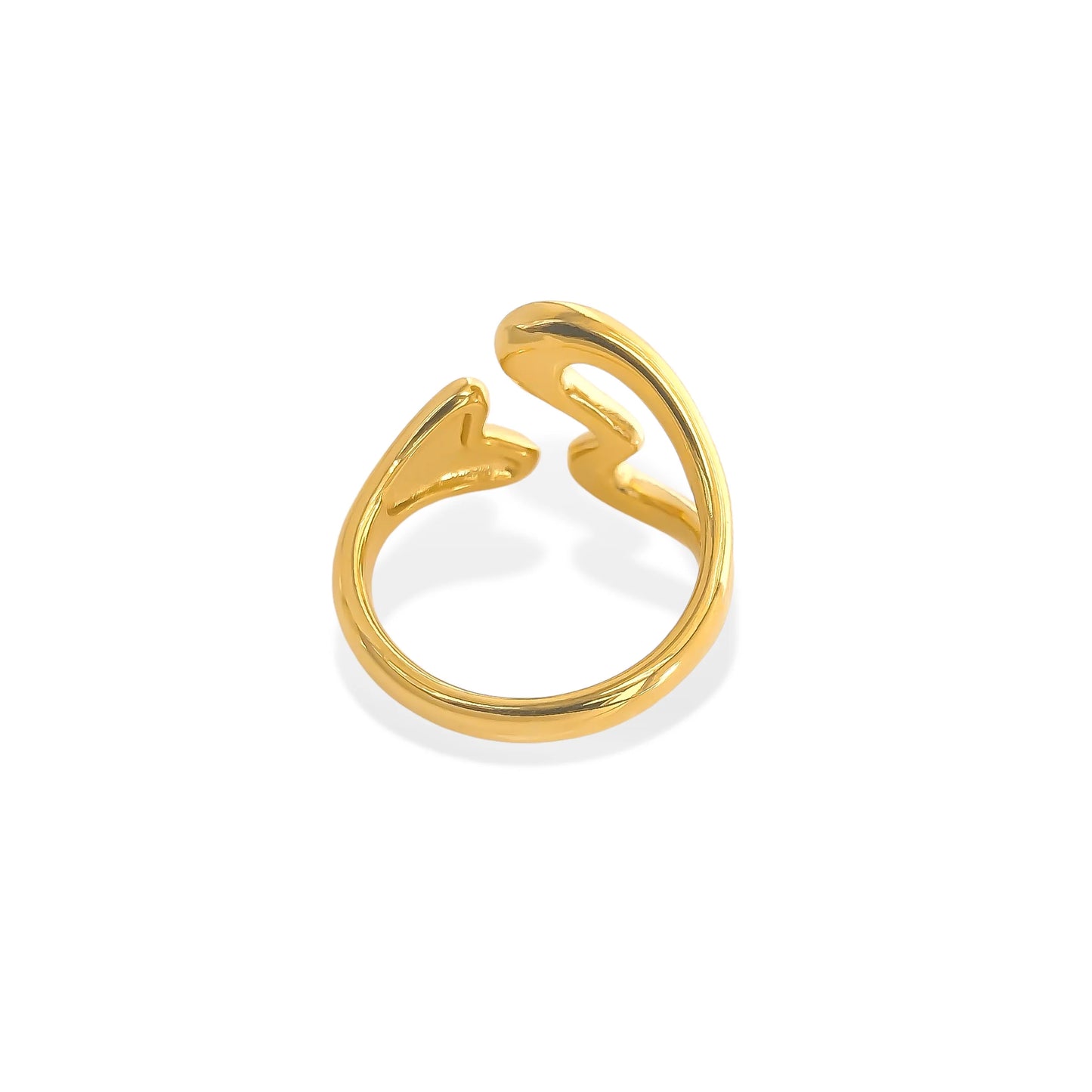Gold ring with a heart design on a white background