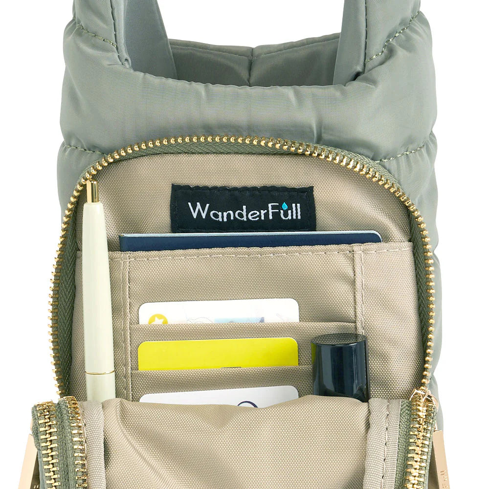 Green bag with interior compartments and WanderFull label