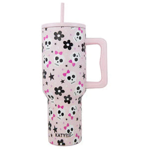 Pink tumbler with floral pattern and straw on a white background