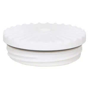 White ceramic bowl with ribbed texture on a white background