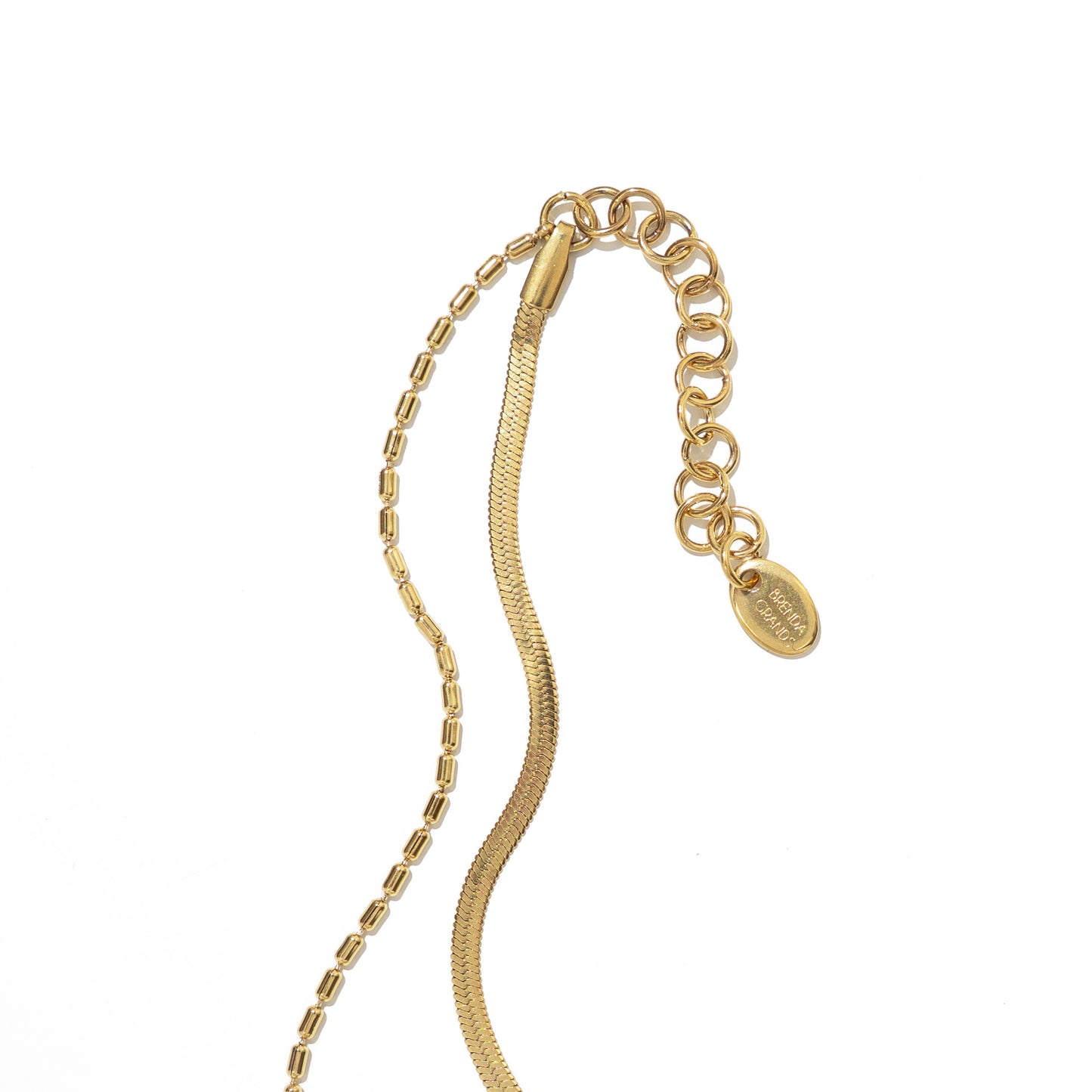 Gold anklet with a clasp on a white background