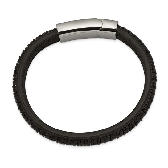 Black leather bracelet with a silver clasp on a white background
white background
Material: stainless steel, black braided leather
Color: silver, black
Closure: slide in clasp
Measurement: 8.25" circumference, 11 mm wide