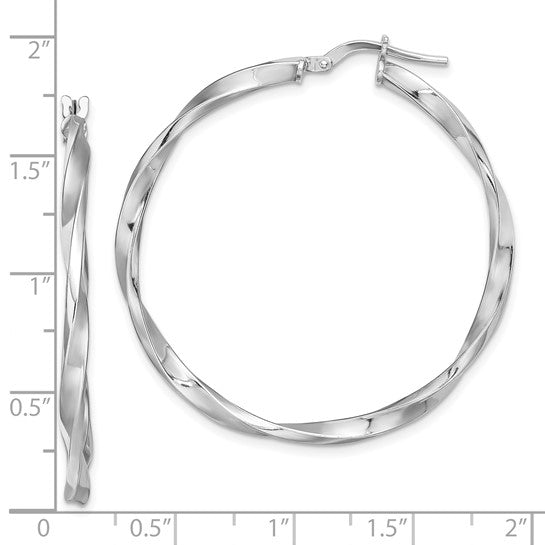 Silver hoop earrings with twisted design on a white background, shown with measurements.
Material: sterling silver rhodium-plated
Color: silver
Closure: Wire & Clutch
Measurement: 40.4 mm width, 41.9 mm length, 2.4 mm thickness