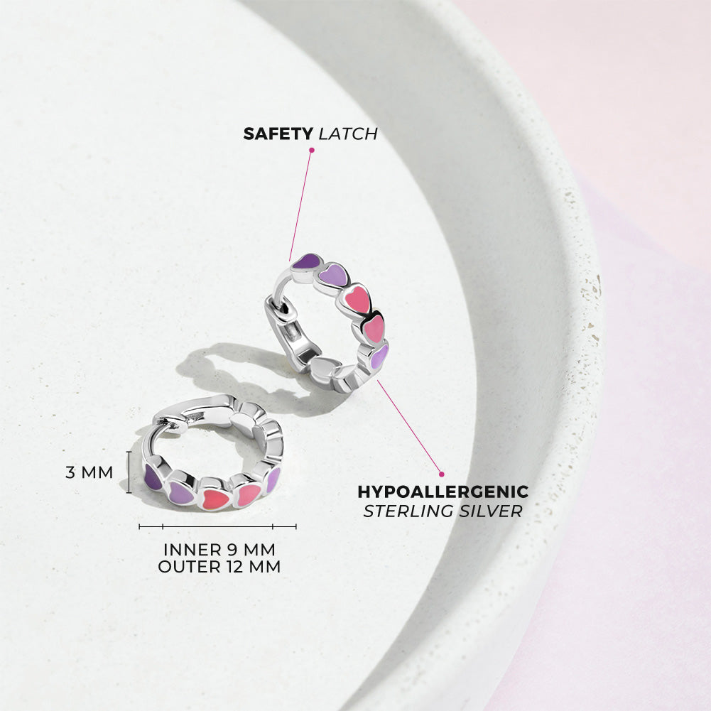 Age Group: Cute for Girls or Teens; Safe for Sensitive Ears
925 Sterling Silver
Earring Size: Outer: 0.47 in. (12mm); Inner: 0.35 in. (9mm)
Metal Stamp: 925
Cascading heart design with purple and pink earrings on sterling silver. Picture of close up with measurements and materials listed