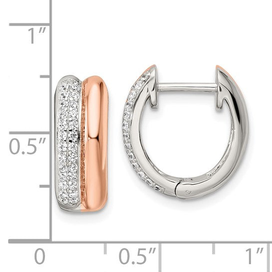 Rose gold and silver hoop earrings with clear stones, shown with a measurement scale.
Material: sterling silver, rose-toned (Flash Plating), pave CZ
Color: silver and rose-gold
Closure: Post, Notch, Lock
Measurement: 6.05 mm thickness, 16.5 mm length, 15.2 mm width