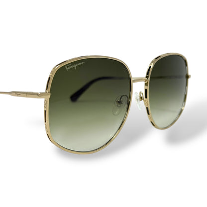 Ferragamo - SF277S Sunglasses women, oversized, lightweight, round wire gold frame with green gradient lens. front, corner view close up of logo on lens