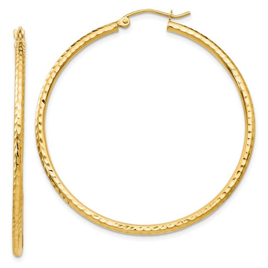 Gold hoop earrings on a white background
Material: 10K yellow gold
Color: yellow gold
Closure: Wire and Clutch
Measurement: 45 mm width, 45 mm length, 2 mm thickness
Style: 10TC237