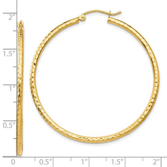 Gold hoop earrings with a measurement scale on a white 
Material: 10K yellow gold
Color: yellow gold
Closure: Wire and Clutch
Measurement: 45 mm width, 45 mm length, 2 mm thickness
Style: 10TC237background