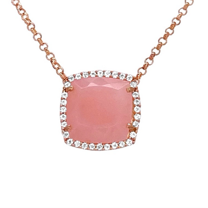 Necklace with a pink stone and rose gold chain on a white background
18K Rose Gold Vermeil over 925 Silver - 3.7 grs
Cushion cut Rose Chalcedony - 12mm cushion gemstone w/ 5.6 cts
32 White Topaz round 1.0 mm diamond cut