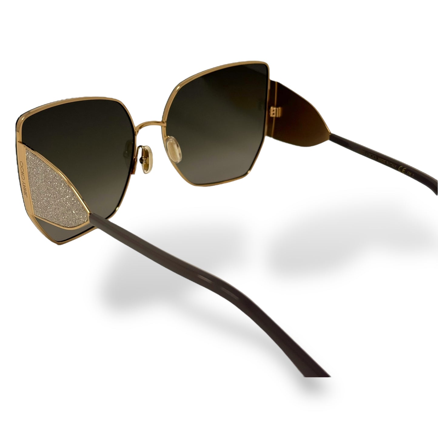 Jimmy Choo - Rivers Women Sunglasses oversized, side crystals on arm design, gold frame, dark brown lens gradient. top, interior view. logo shown on arm