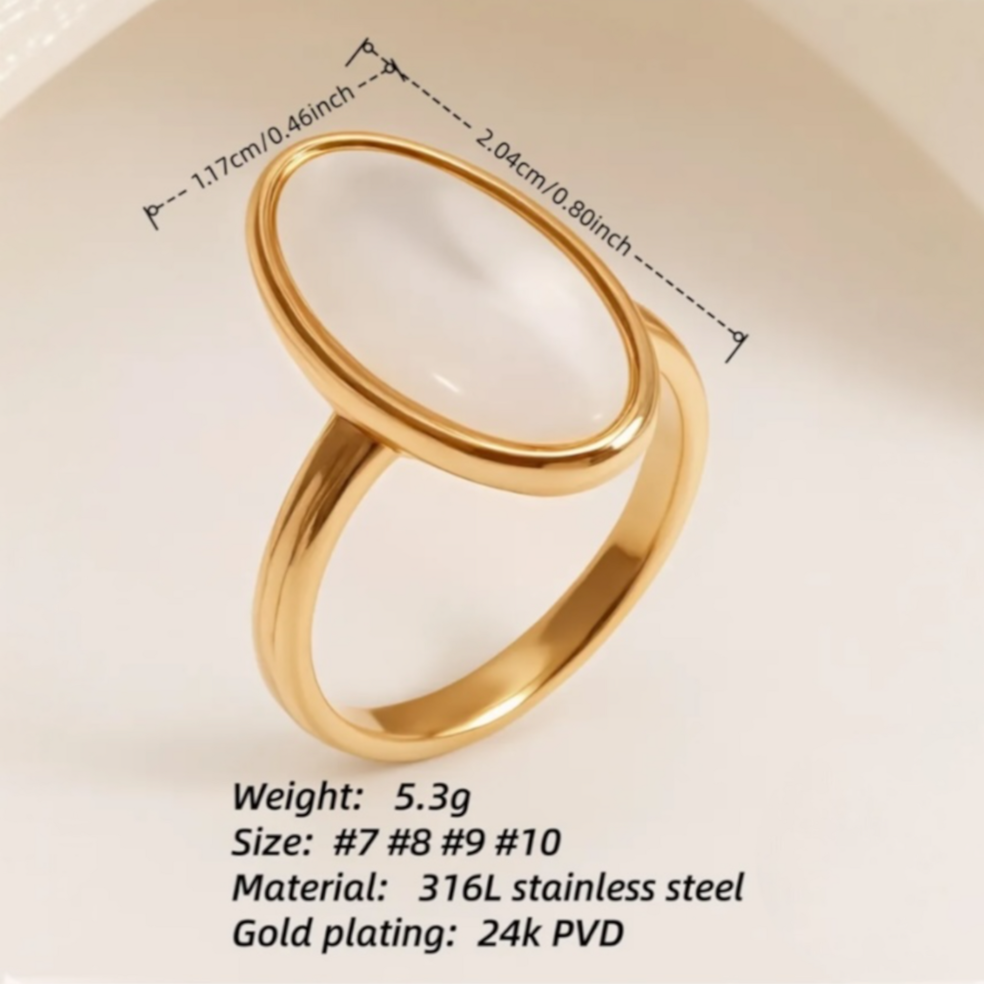 gold with white oval deign ring 