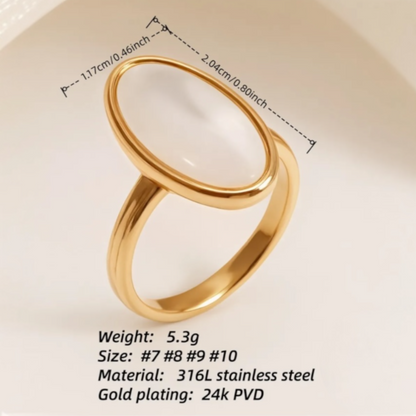 gold with white oval deign ring 