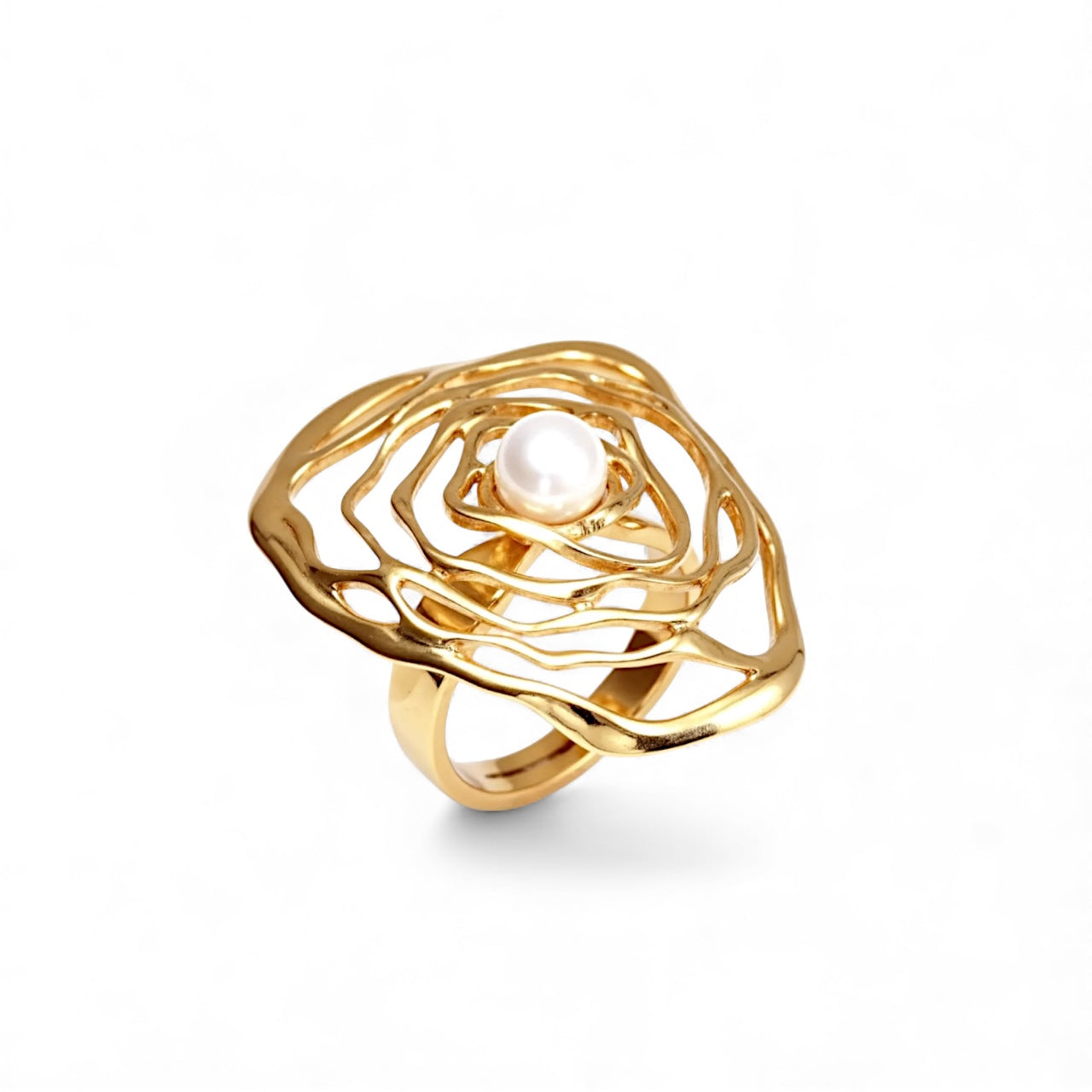 Gold ring with a pearl at its center on a white background