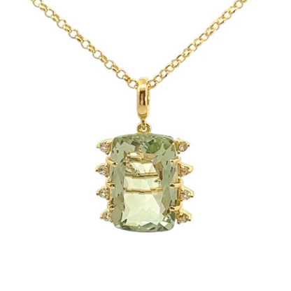 Gold necklace with a green gemstone pendant on a white background
18K Gold plated over 925 Silver - 3.5 grs
Antique cut Prasiolite - 10.6 cts
11 White Topaz round 1.0 mm diamond cut