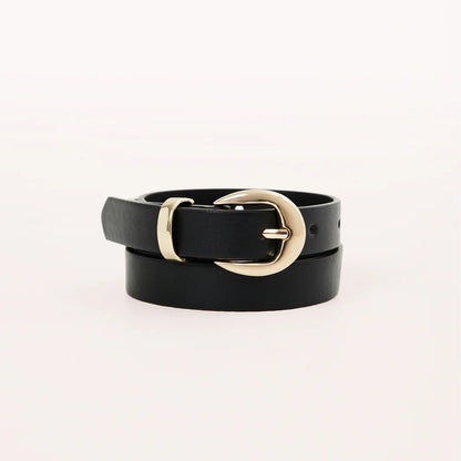 Black belt with a gold buckle on a light gray background