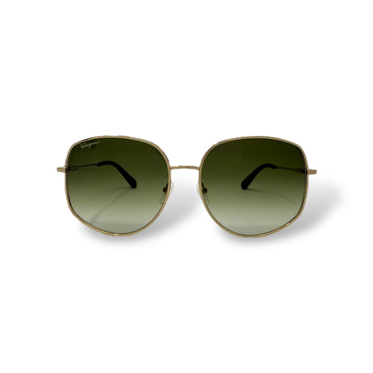 Ferragamo - SF277S Sunglasses women, oversized, lightweight, round wire gold frame with green gradient lens. front view. logo seen in lens