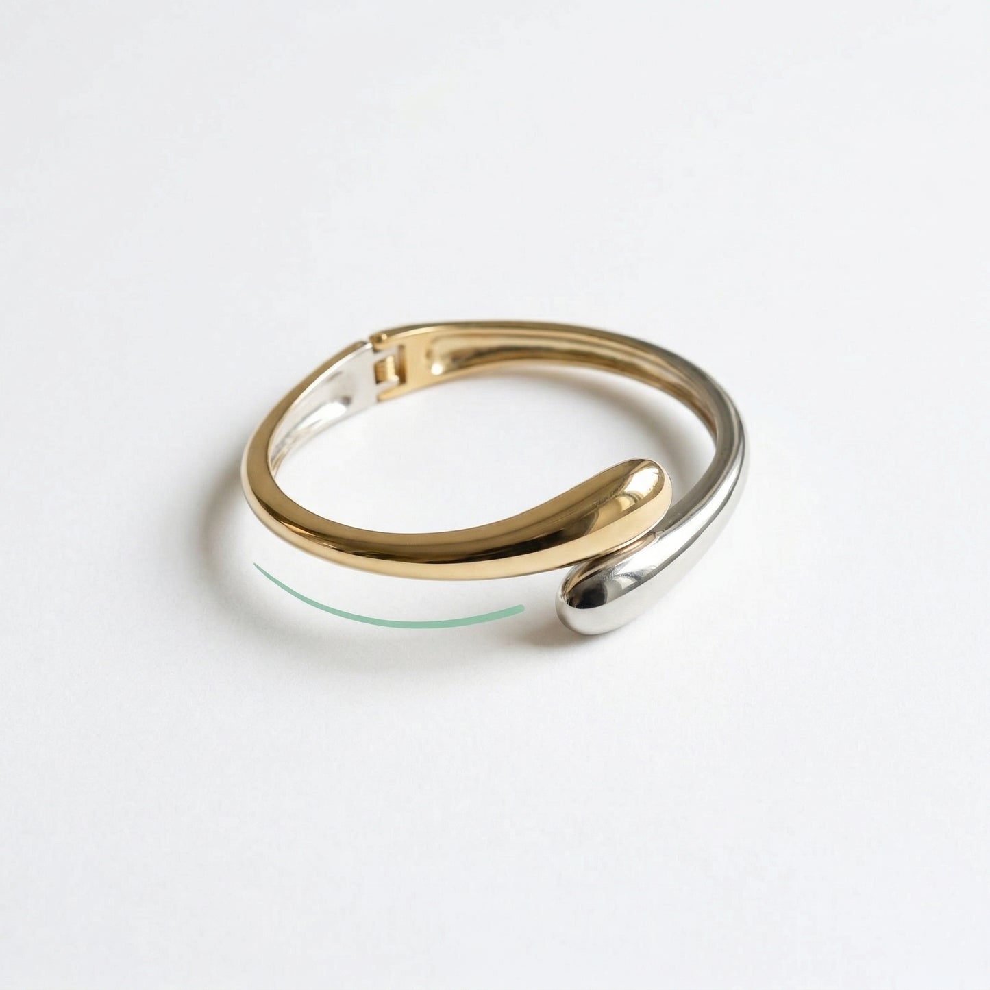 Gold and silver ring on a white background