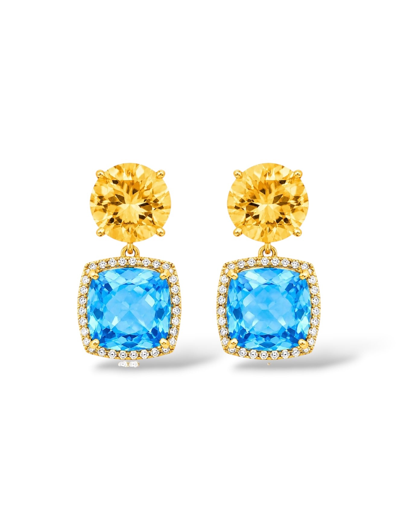 A pair of gold drop earrings featuring a round yellow gemstone on top of a square blue gemstone surrounded by small pavé-set clear stones, shown on a white background.