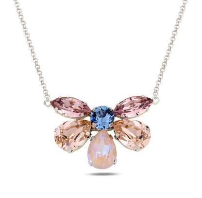 Necklace with pink and blue crystals on a white background
Material: 925 sterling silver, rhodium-plated, 6 Swarovski crystals&nbsp;

Color: silver, light pink, light blue, purple, and opal&nbsp;

Measurement: 14" length, 1" extension, 1 mm wide chain, pendant: 3.5 cm x 2.5 cm