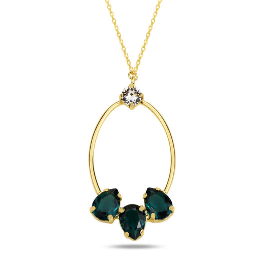 Gold necklace with green swarovski crystals  on a white background