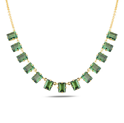 Necklace with green swarovski crystals on a white background
