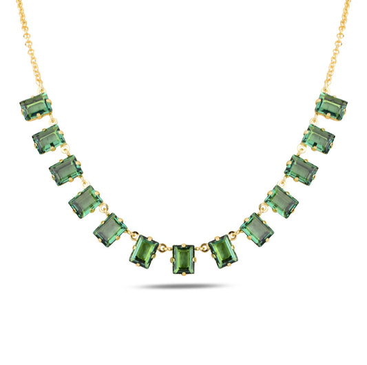 Necklace with green swarovski crystals on a white background