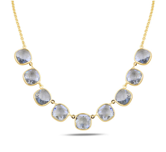 Gold necklace with blue crystals on a white background
Material: 925 sterling silver, gold-plated, cushion cut translucent light Aquamarine Swarovski crystals&nbsp;

Color: gold, light blue

Measurement: 14" length, 1" extension, 1 mm wide chain
