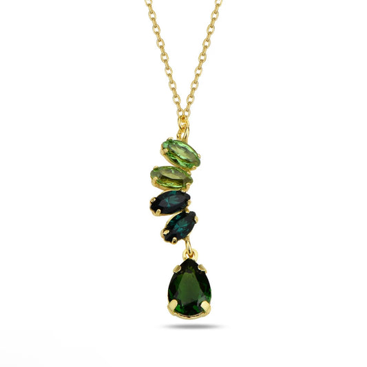 Gold necklace with green swarovski crystals on a white background