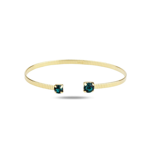 Gold bracelet with green crystals on a white background
Material: 925 sterling silver, gold plated, green Swarovski crystals&nbsp;

Color: gold, dep green

Measurement: 6" length, 3 mm wide&nbsp;

Closure: open, disconnected