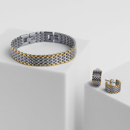 Two-tone bracelet and earrings on a light gray background