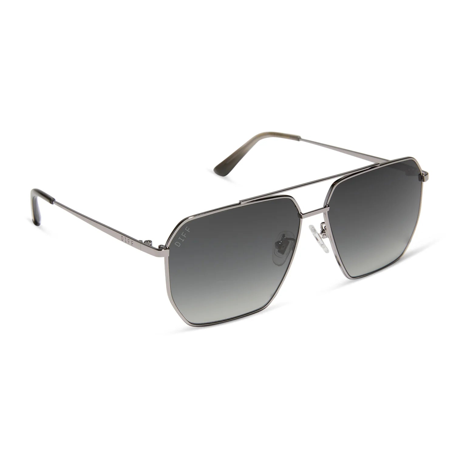 Sunglasses with metallic frame and gradient lenses on a white background