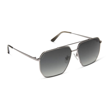 Sunglasses with metallic frame and gradient lenses on a white background