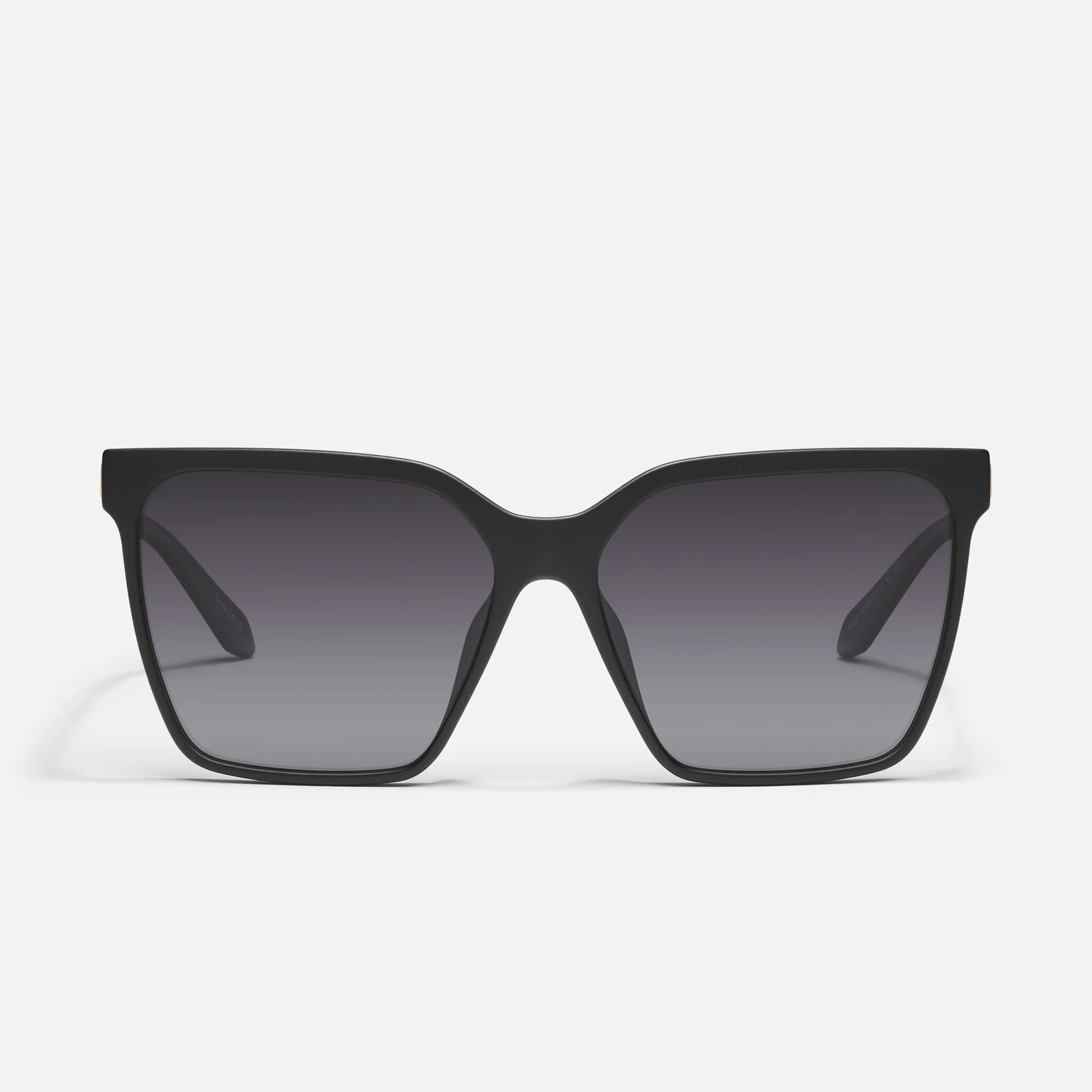 Black sunglasses with dark lenses on a white background