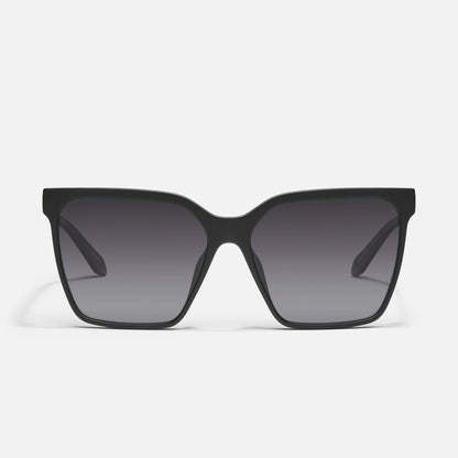 Black sunglasses with dark lenses on a white background